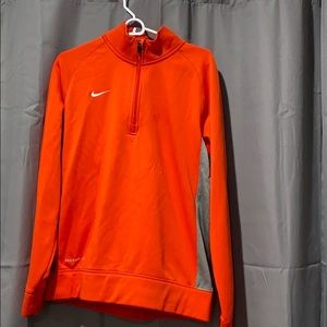 Bright orange Nike quarter zip jacket